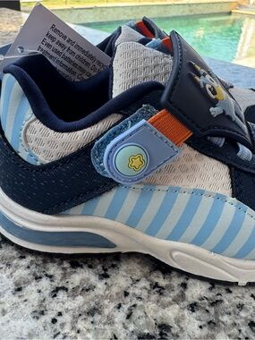 Kids Light Blue and Navy Stripe Athletic Sneakers with Character Accent light up